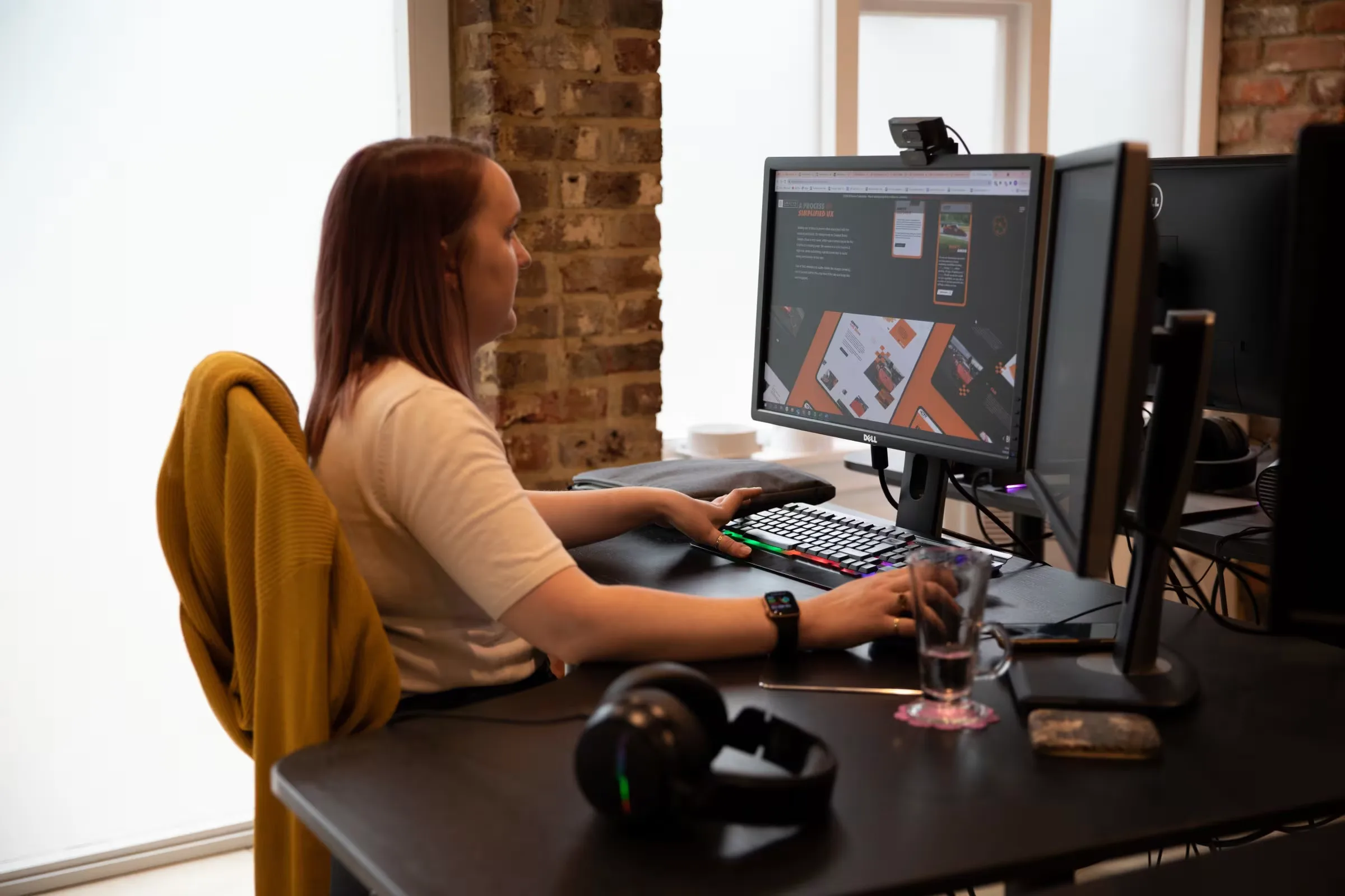 website design agency sitting desk